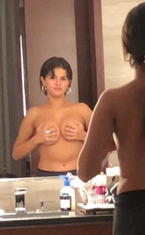 Selena Gomez boobs squeezing